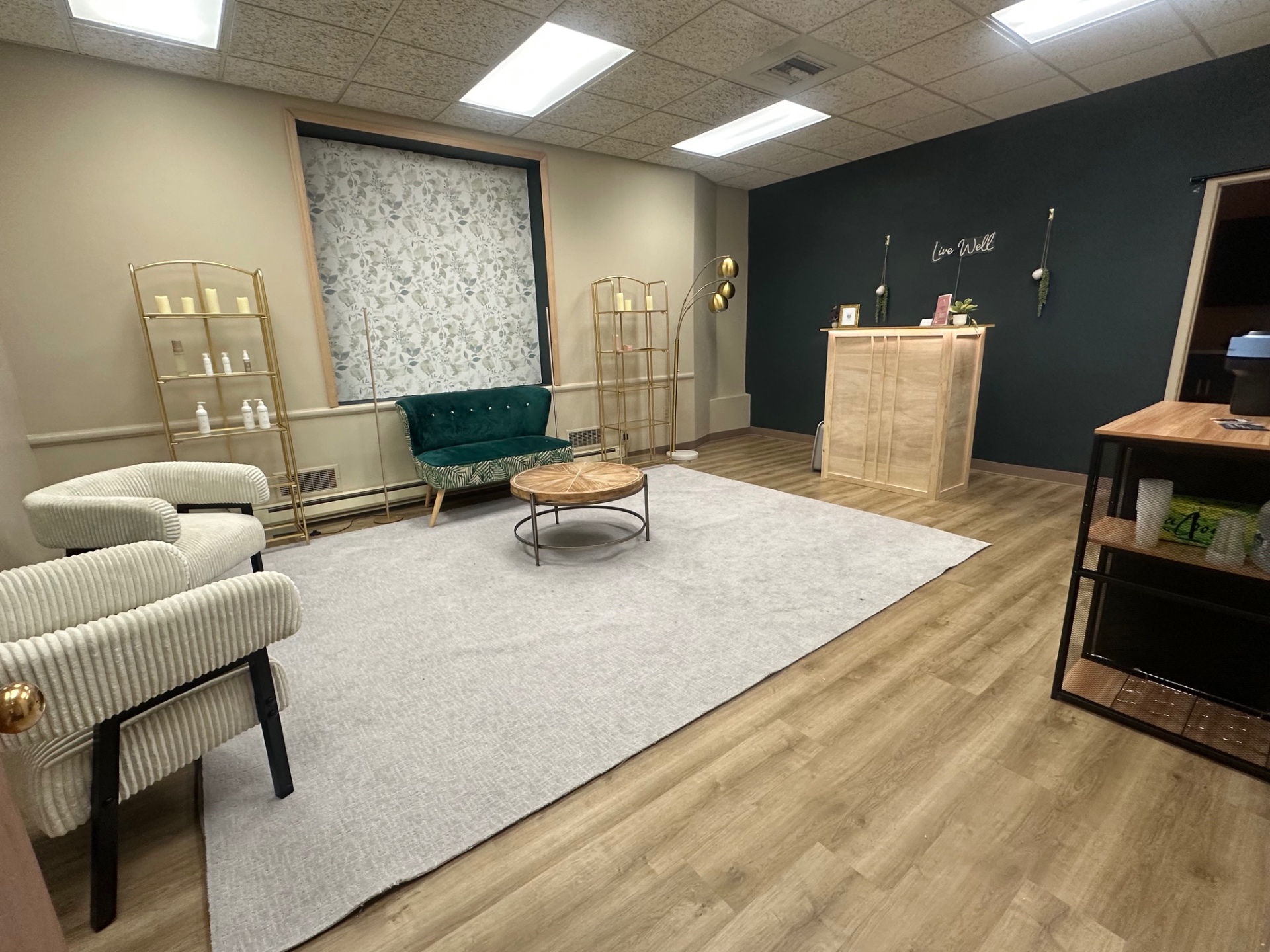 Exchange Building Suite 120 — main lounge area with seating and retail shelving