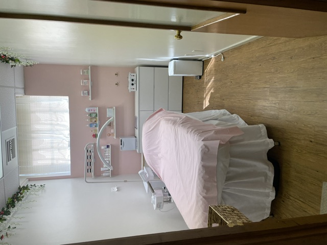 Exchange Building Suite 10 — private adjoining room with treatment bed and natural light